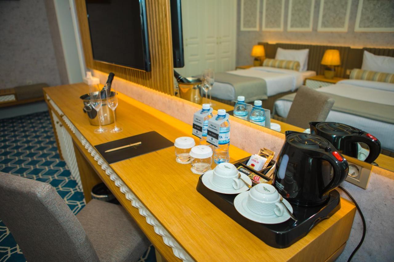 Promenade Hotel Baku Bagian luar foto A hotel room with a Nespresso machine