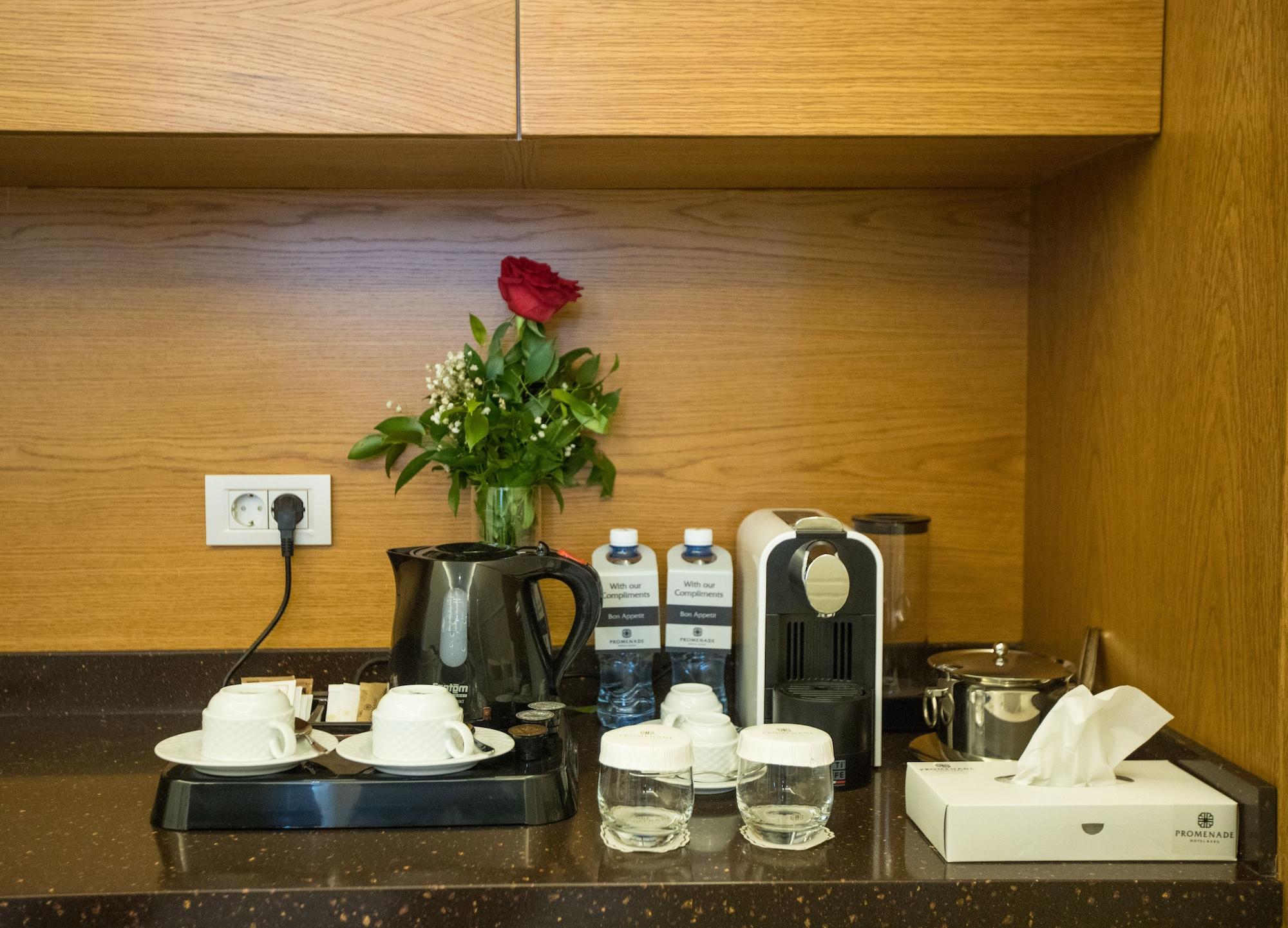 Promenade Hotel Baku Bagian luar foto A Nespresso machine in a hotel room
